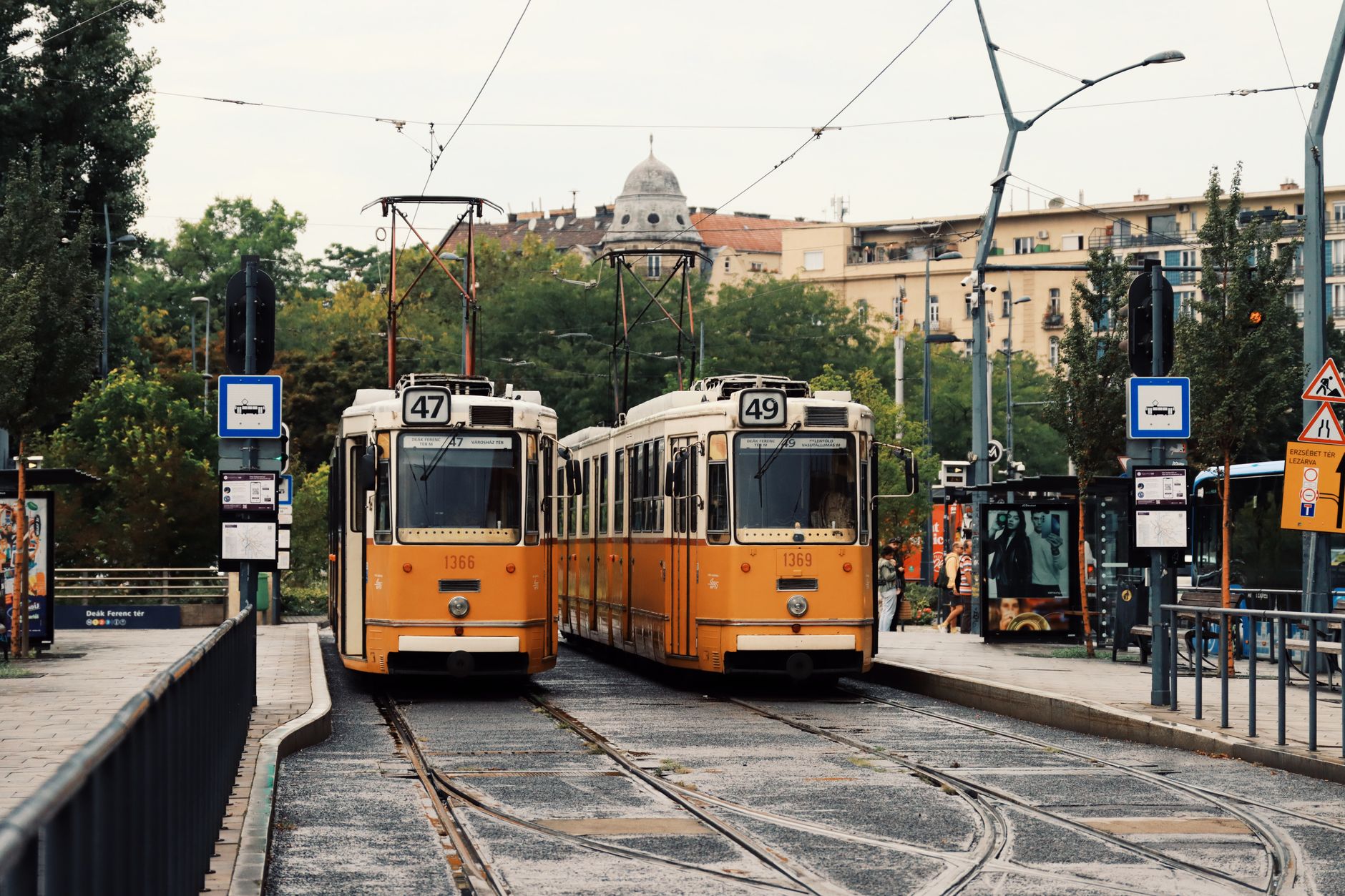 A yellow tram on a Budapest street